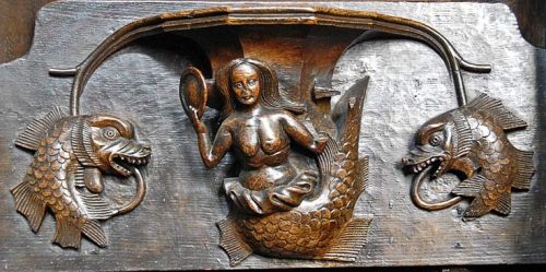 A mermaid with supporters