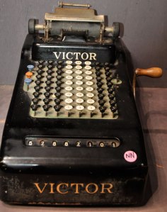 Antique adding machine