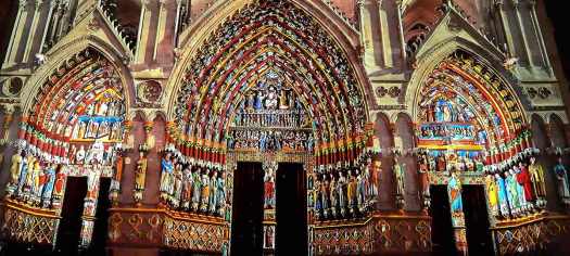 A light show at Amiens Cathedral attempting to replicate the building's original exterior decoration